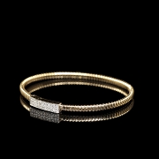 Pulsera rígida de oro amarillo de 18 kt con diamantes