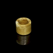 Anillo de arquero de jade tallado, cultura Liangzhu