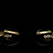 Gemelos de bronce con ágatas ovaladas