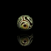 Cuenta de piedra tallada Dzi, Tíbet, dinastía Ming