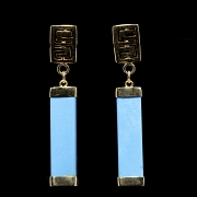 Pendientes con movimiento, en oro amarillo de 18 k y turquesa