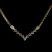 Gargantilla de oro amarillo con esmeraldas y diamantes