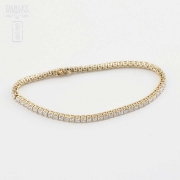 Pulsera riviére en oro amarillo de 18k y diamantes. - 9