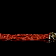 Gold necklace with diamonds and coral beads