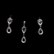 Conjunto de pendientes y colgante en oro blanco 18k con zafiros y diamantes