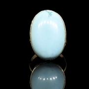 Anillo en oro amarillo de 18k con turquesa oval