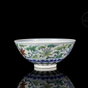 Porcelain bowl with doucai enamels, ‘Flowers’, with Qianlong seal