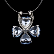 Colgante oro blanco 18K con topacios