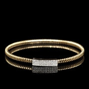 Pulsera rígida de oro amarillo de 18 kt con diamantes
