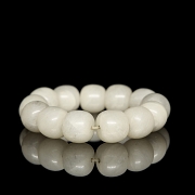 Bracelet with thirteen jade beads, 20th century