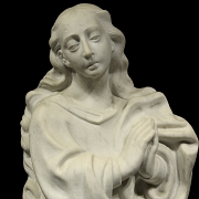 Busto de mármol tallado