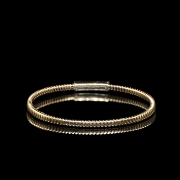 Pulsera rígida de oro amarillo de 18 kt con diamantes