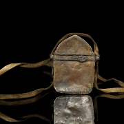 Amuleto de bronce