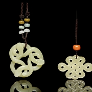 Two carved jade pendants, 20th century