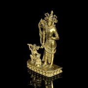 Grupo escultórico de bronce dorado 