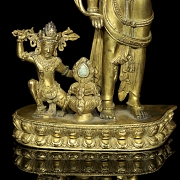 Grupo escultórico de bronce dorado 
