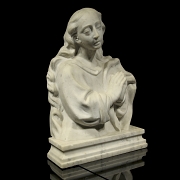 Busto de mármol tallado