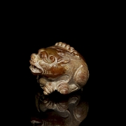 Figura de jade amarillo