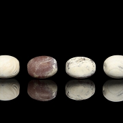 Four large carved stone beads, Qing dynasty