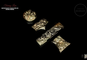 Set of carved jades, ‘Ornaments for sword handles’, Han dynasty