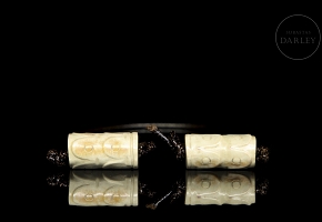 Pair of tubular carved stone pendants, Zhou style