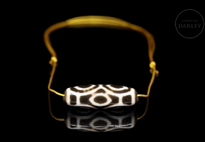 Agate Dzi bead “Six Eyes,” Tang dynasty