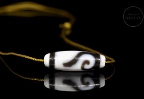 Carved agate dzi “Spiral,” Tang dynasty