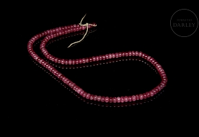 Long ruby bead necklace