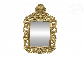 Carved and gilded wooden mirror, 20th century