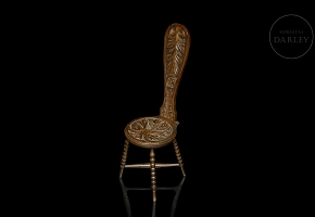 Silla giratoria tallada, s.XX