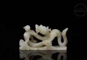 white jade figure “Dragon with Pearl,” Qing dynasty