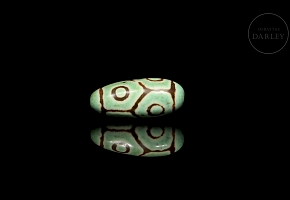 Carved stone Dzi bead ‘Six Eyes’, Qing dynasty