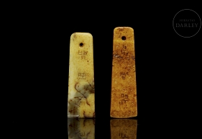 Pair of carved stone pendants, ‘Calligraphy’, 20th century