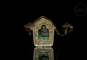 Amuleto de bronce
