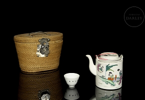 Glazed porcelain tea set with wicker basket, 20th century
