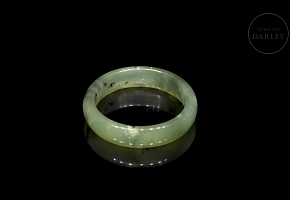 Carved green jade bangle, 20th century