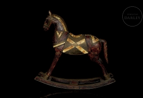 Caballo balancín de madera tallada, s.XX