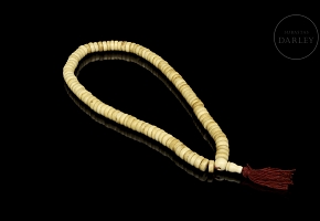 Necklace with 110 carved bone beads, 20th century
