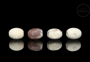 Four large carved stone beads, Qing dynasty