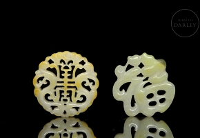 Pair of carved jade pendants, 20th century