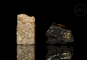 Two carved stone figures, 20th century