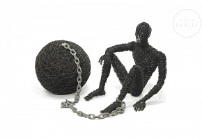 Metal sculpture ‘Man in Shackles’, 20th century