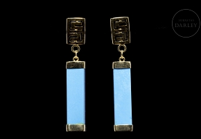 Pendientes con movimiento, en oro amarillo de 18 k y turquesa