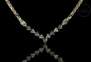 Yellow gold choker with emeralds and diamonds