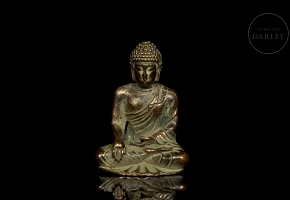 Figura de bronce dorado 