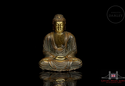Figura de bronce dorado 