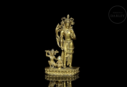 Grupo escultórico de bronce dorado 