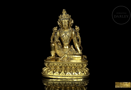 Figura de bronce dorado 