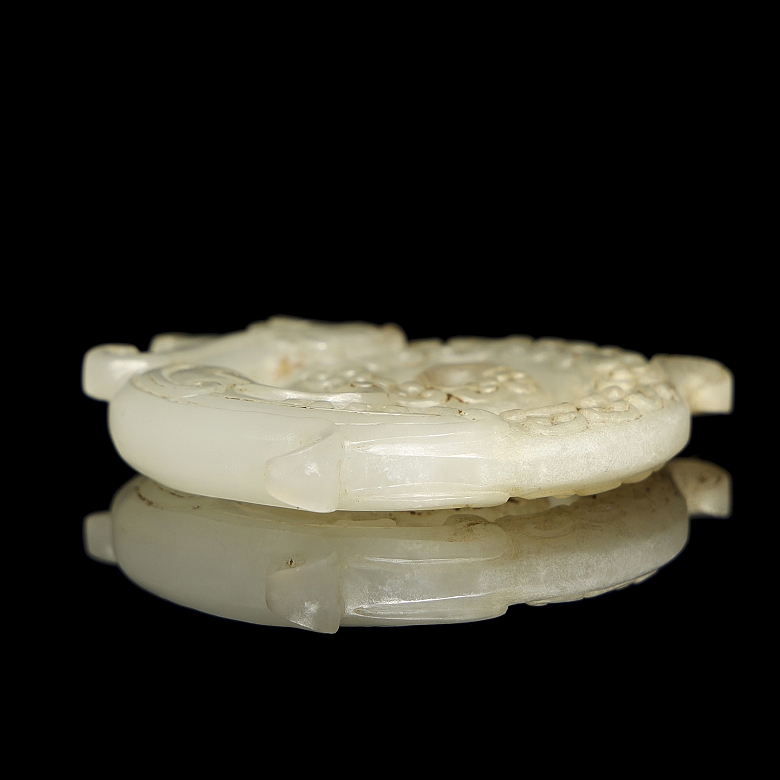 Carved white jade pendant “Dragon,” Han dynasty