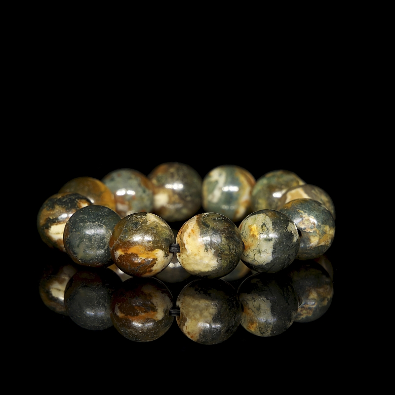 Antigua pulsera de doce cuentas de ágata tallada